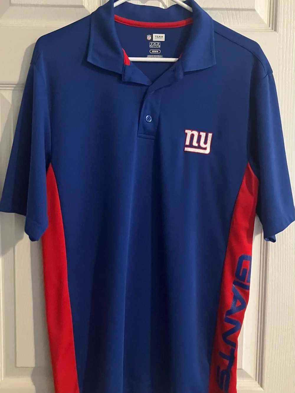 Youth New York Giant’s Royal Blue Polo with Red Side Panels Size M